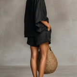 Lila Spitzen-Bluse mit Bootsausschnitt und Shorts-Set