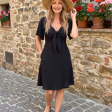 Silum | Kurzes Kleid mit schwingendem Rock und kurzen Flatterärmeln