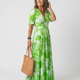 Ione | Kurzes ärmelloses V-Ausschnitt Blumen-Midi-Kleid